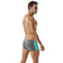 male model in swim trunks