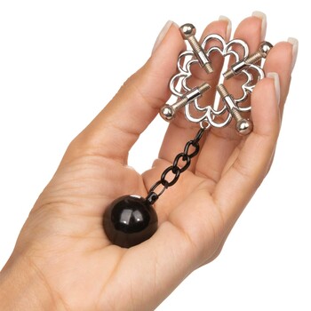 Nipple Grips 4-Point Weighted Nipple Press hand held