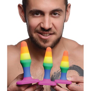 Rainbrow Ready Silicone Anal Trainer Set held by male